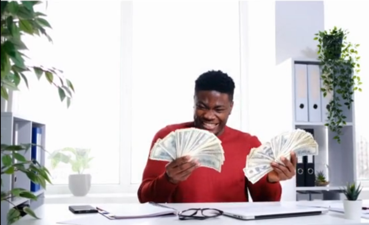 man being paid more and happy